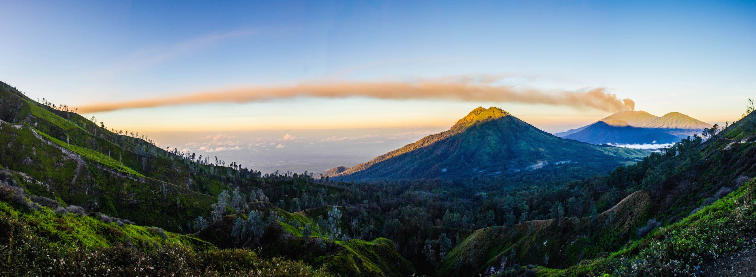 Panoramic view of the ash trail left by the erupting Mt. Raung, Indonesia