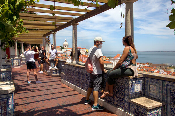 Tourists at the Santa Luzia Viewpoint in Lisbon last week.