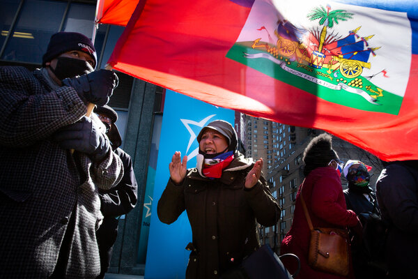 Members of Montreal’s Haitian diaspora holding an anti-Moïse demonstration outside the Haitian consulate in March.