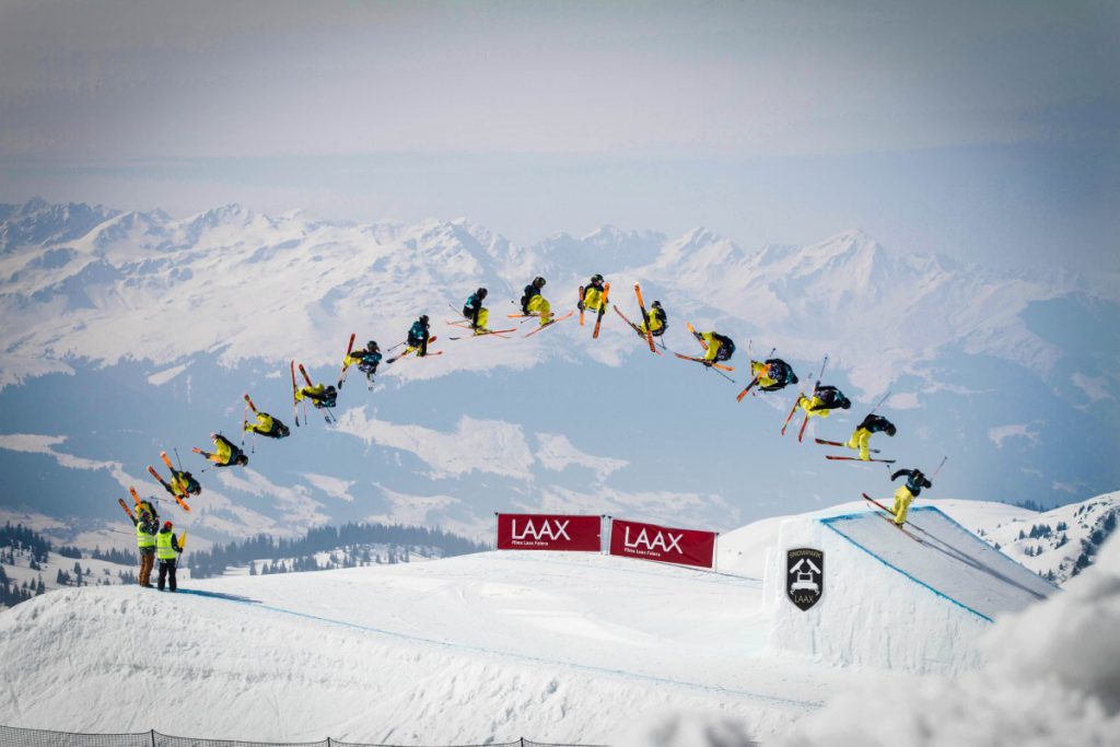 freestyle skier does huge trick on jump in Laax