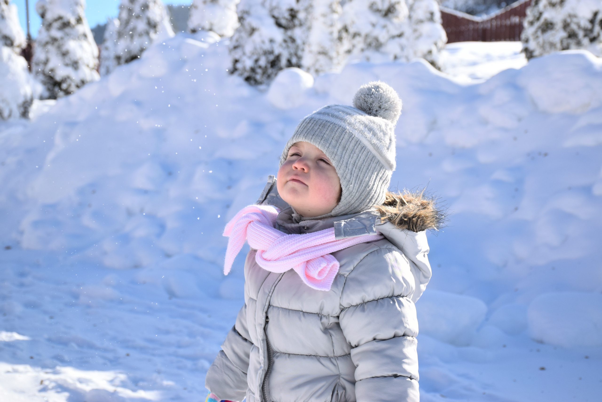 Small child in puffy winter ski jacket