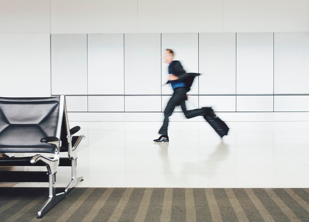 person running in airport