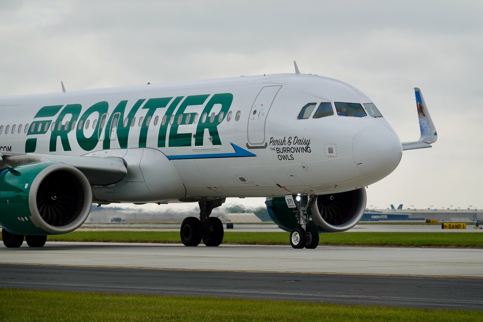 Exterior of Frontier plane on the runway