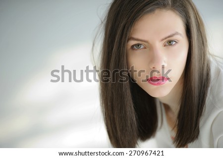 http://thumb7.shutterstock.com/display_pic_with_logo/2813080/270967421/stock-photo-androgynous-beautiful-young-man-like-a-beautiful-woman-with-red-lipstick-270967421.jpg