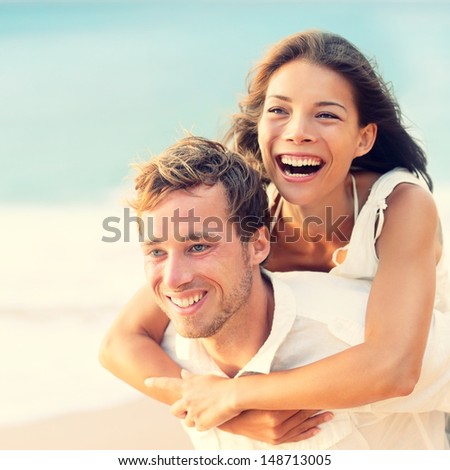 https://thumb7.shutterstock.com/display_pic_with_logo/97565/148713005/stock-photo-love-happy-couple-on-beach-having-fun-piggyback-ride-outdoor-smiling-happy-laughing-together-on-148713005.jpg