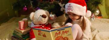 Book Reading Under The Christmas Tree