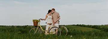 Couple on Bikes in The Field Facebook Cover