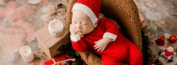 Cute Baby in Santa Claus Outfit Facebook Banner
