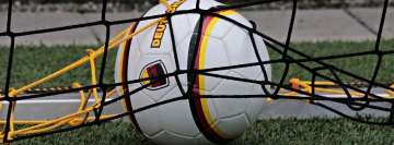 German Soccer Ball Inside a Net