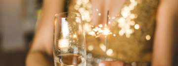 Handwunderkerze und Champagner für das neue Jahr