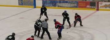Hockey Athletes in The Middle of a Game