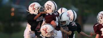Kids Get Serious at The Football Game Facebook Cover Photo