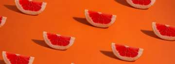 Sliced Pomelo on Orange Background