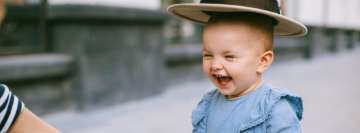 Smiling Little Kid in Hat Facebook Wall Image