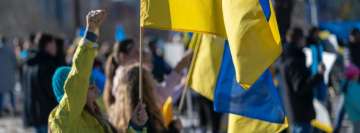 Woman Activist Raising Ukrainean Flag Facebook Cover Photo