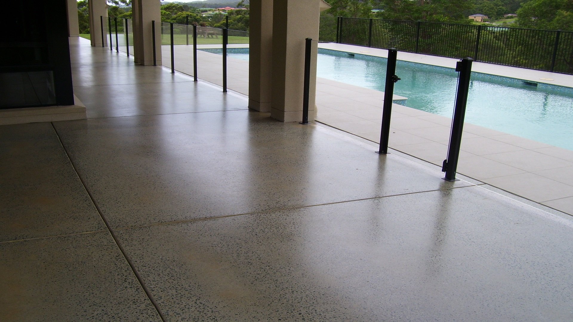 honed concrete to external paths near pool area