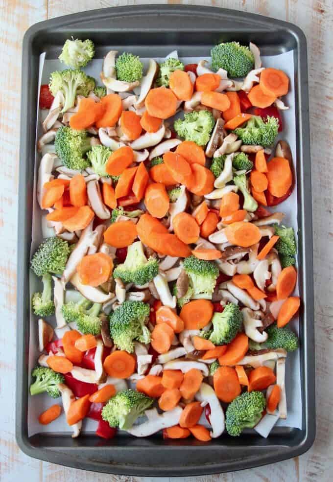 Overhead image of chopped veggies on baking sheet