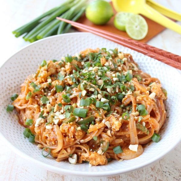 Spicy Vegetable Pad Thai Recipe topped with Green Onions, Peanuts and Cilantro