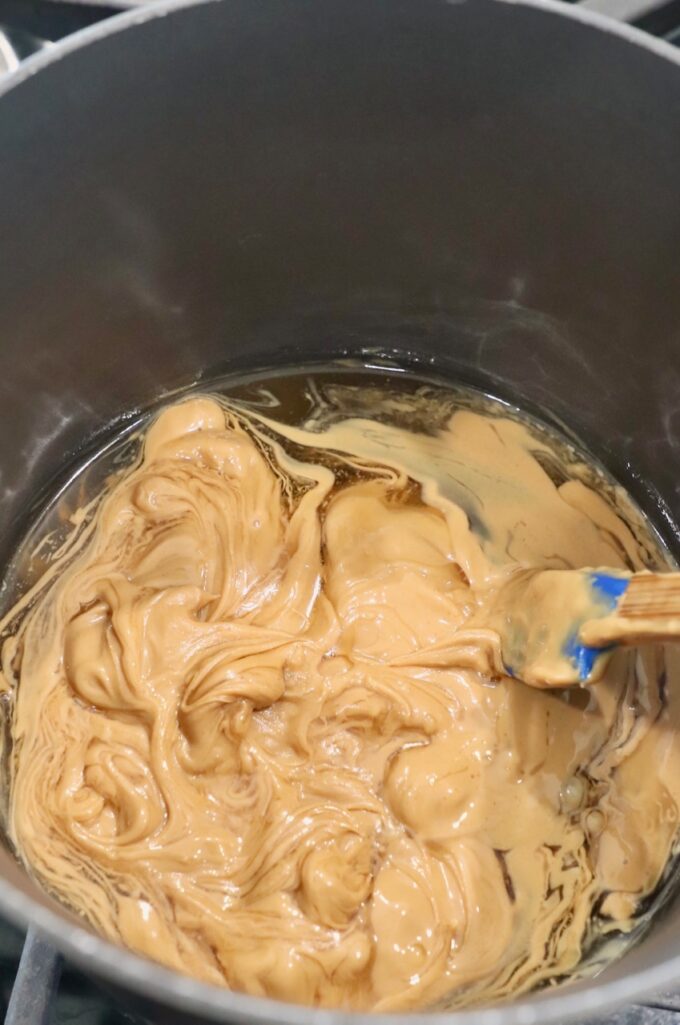 peanut butter and honey in saucepan on the stove