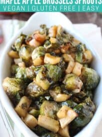 roasted brussels sprouts and apples in white serving dish