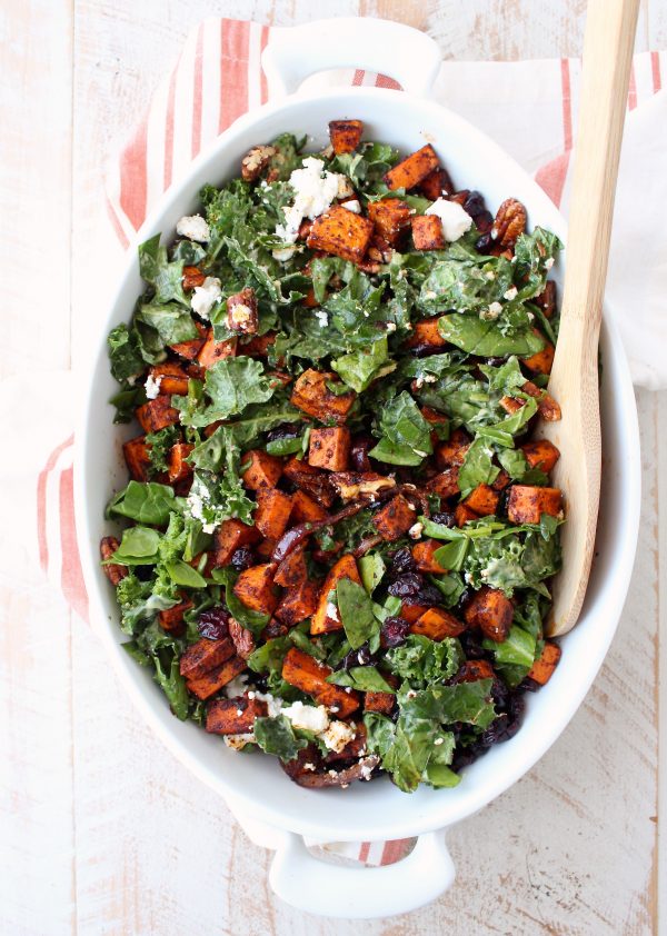 This Chili Roasted Sweet Potato & Cranberry Salad recipe combines sweet, savory & tart ingredients to make the most flavorful vegetarian salad ever!
