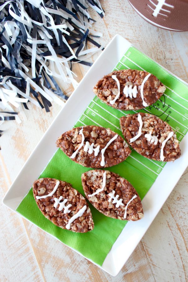 Nutella Rice Krispie Treats are a deliciously easy dessert, make them football shaped for game day parties or Superbowl Sunday!