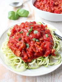 Roasted red peppers add a delicious flavor to this healthy Turkey Bolognese recipe, serve over spaghetti or with zucchini noodles for a gluten free meal.