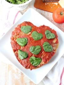 This Italian Meatloaf recipe is easy to make & so delicious! It can be made into a heart shape for Valentine's Day, or made anytime of the year using a traditional meatloaf pan!