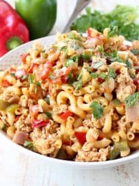 In one pot and only 29 minutes, prepare a delicious chicken fajita pasta dish that will easily become a weeknight family favorite!