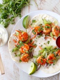 Buffalo Shrimp Tacos are an easy weeknight meal, made in just 15 minutes! They're also perfect for celebrating Taco Tuesday or Cinco De Mayo!