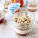 Cinnamon sugar grilled peaches are layered with peach almond milk yogurt and granola in this delicious vegan parfait recipe, great for breakfast or dessert!