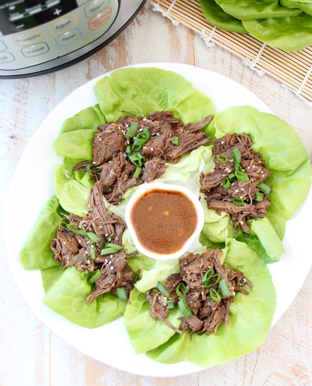 Whole30 Thai Beef is easy to make in the Instant Pot in under an hour. Shred the beef and serve it in lettuce wraps for a Whole30 meal or serve it in corn tortillas for a gluten free Thai twist on Taco Tuesday!