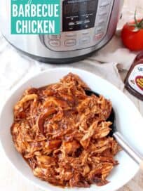 overhead image of shredded bbq chicken in a bowl with a serving spoon