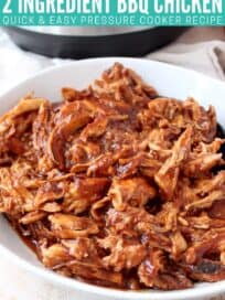 shredded chicken tossed in bbq sauce in bowl