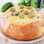 Jalapeno cheese bread bowl with pickled jalapenos and fresh cilantro