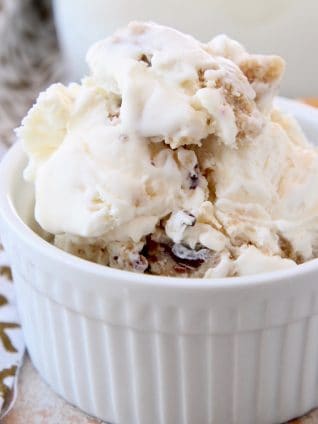 Chocolate chip cookie dough ice cream in small white bowl