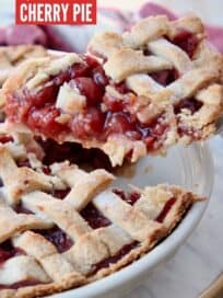 slice of cherry pie lifted out of pie plate