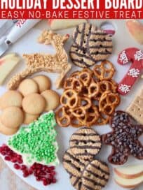 Overhead image of holiday dessert board with pretzels and cookies