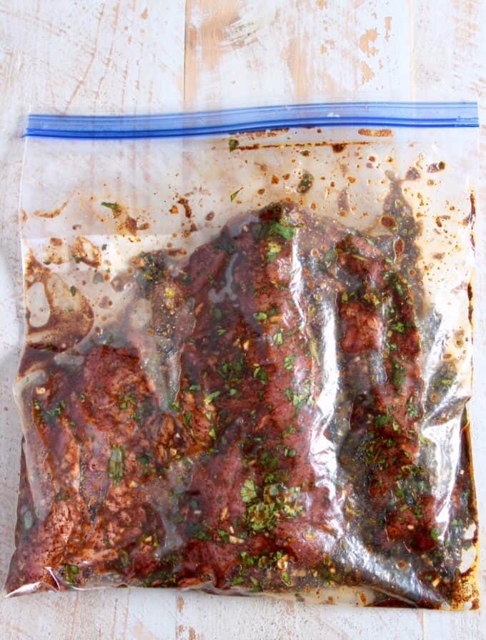 marinating carne asada in ziplock bag