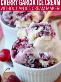 scoops of cherry ice cream in white bowl with gold spoon