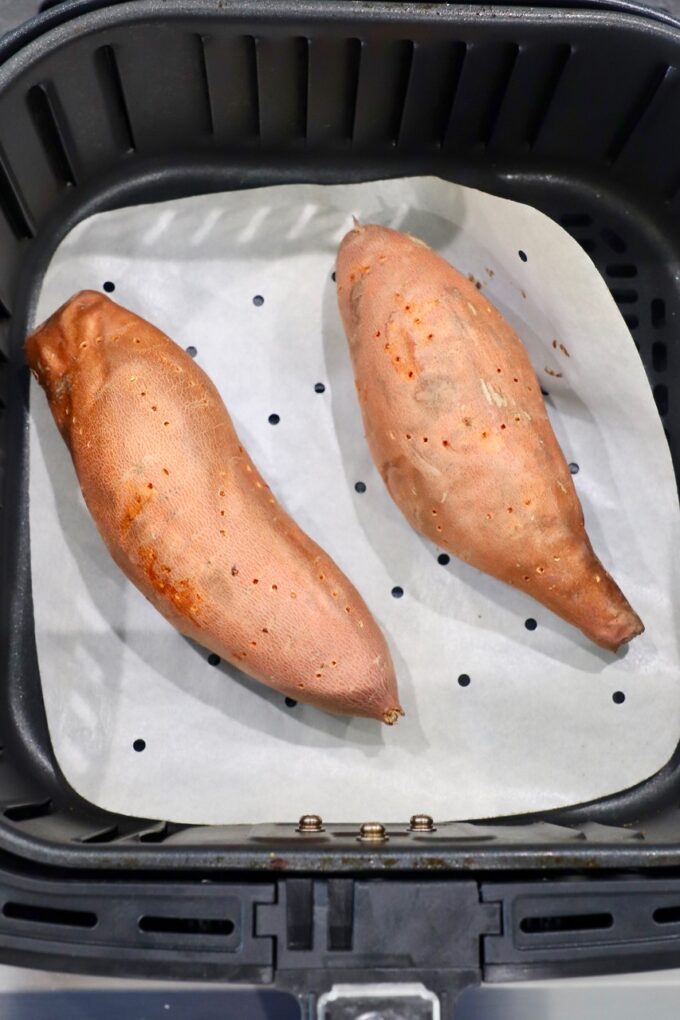 cooked sweet potatoes in air fryer basket