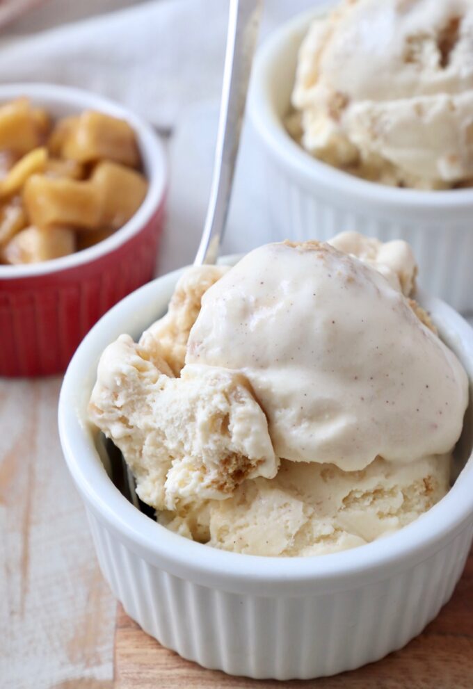 scoops of ice cream in small white bowls with spoon
