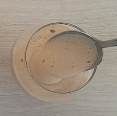 Pour espresso coffee foam with a spoon