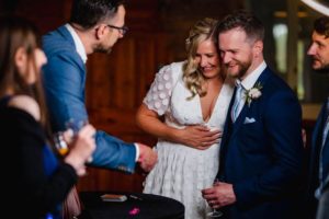 wedding magician performs for bride and groom
