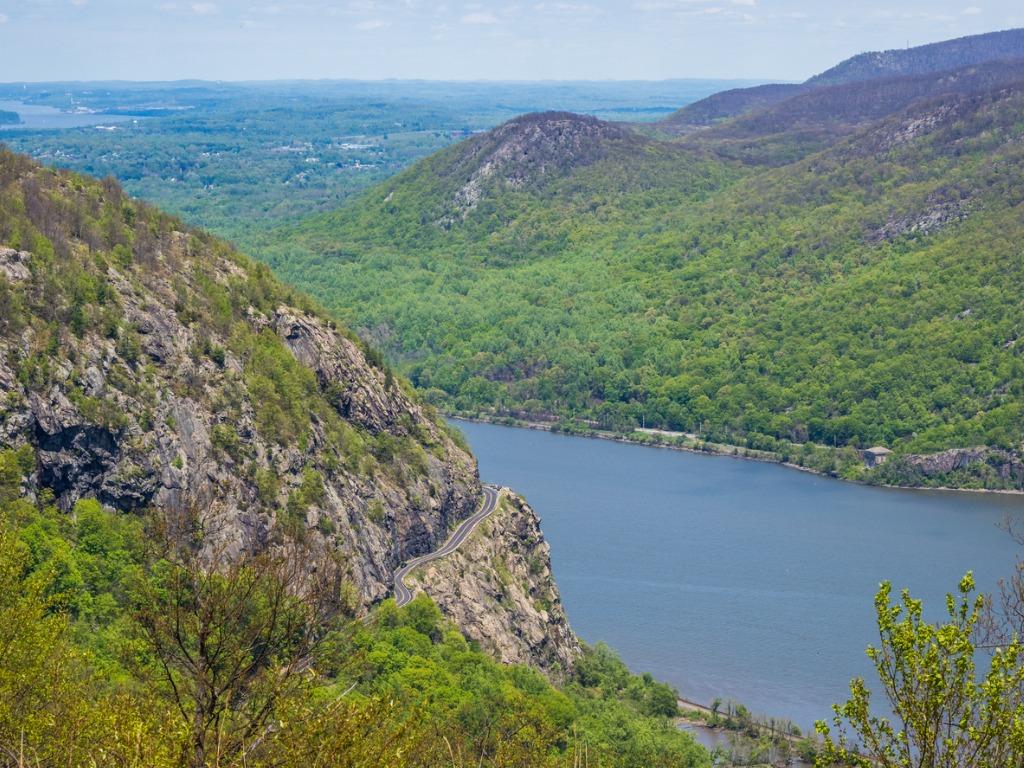 storm king state park from above, mountains and hudson river between them