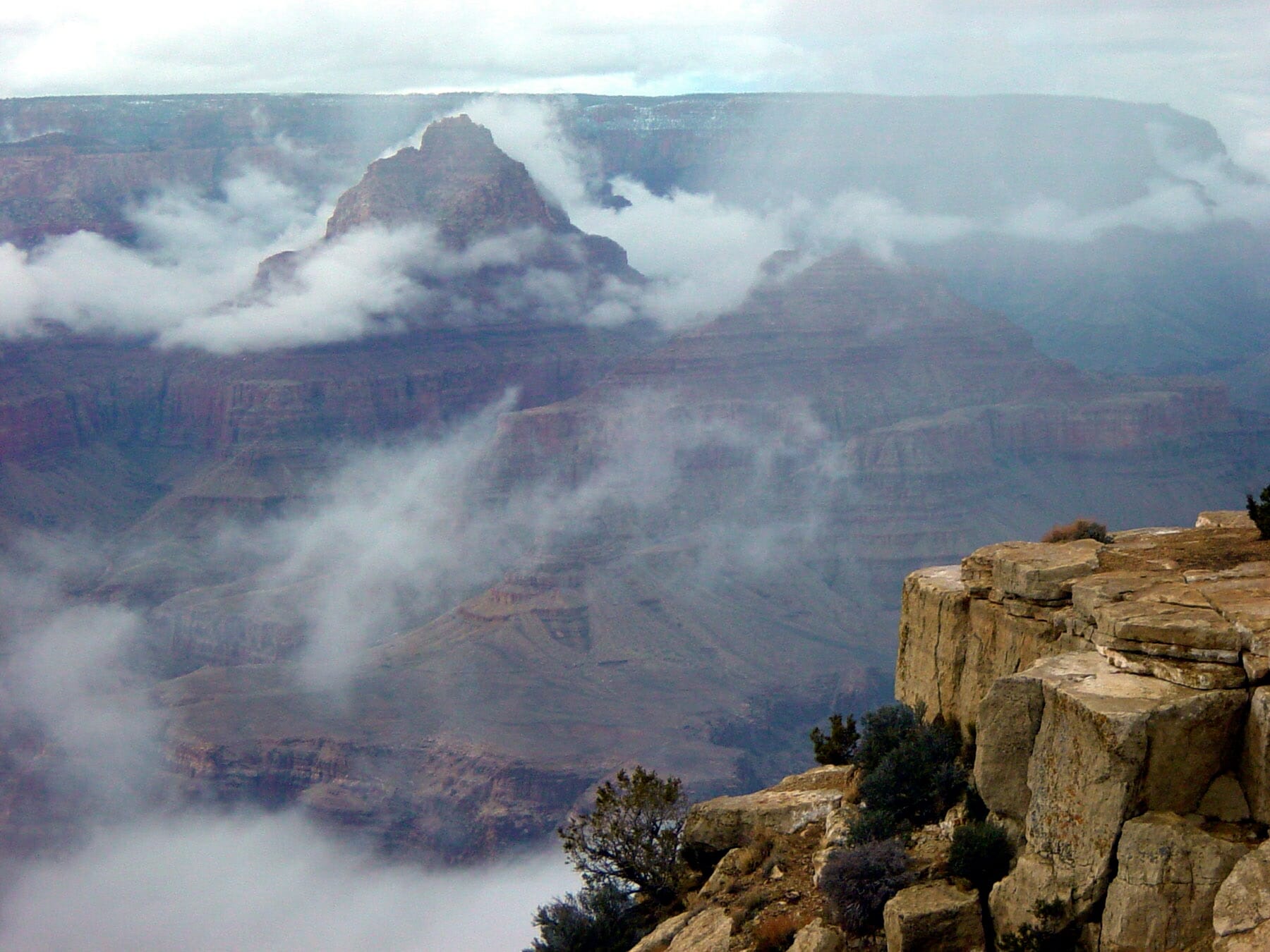 A WINTER INVERSION IN THE CANYON AS SEEN FROM LIPAN POINT ON THE EAST RIM DRIVE, GRAND CANYON NATIONAL PARK.