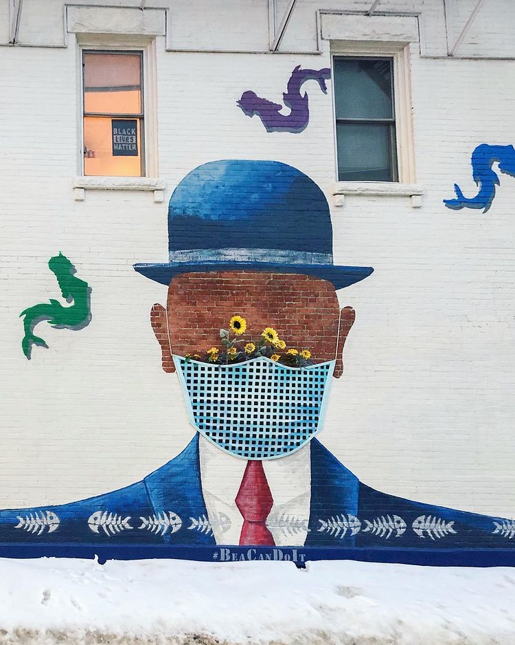 Mural with a man with a mask.