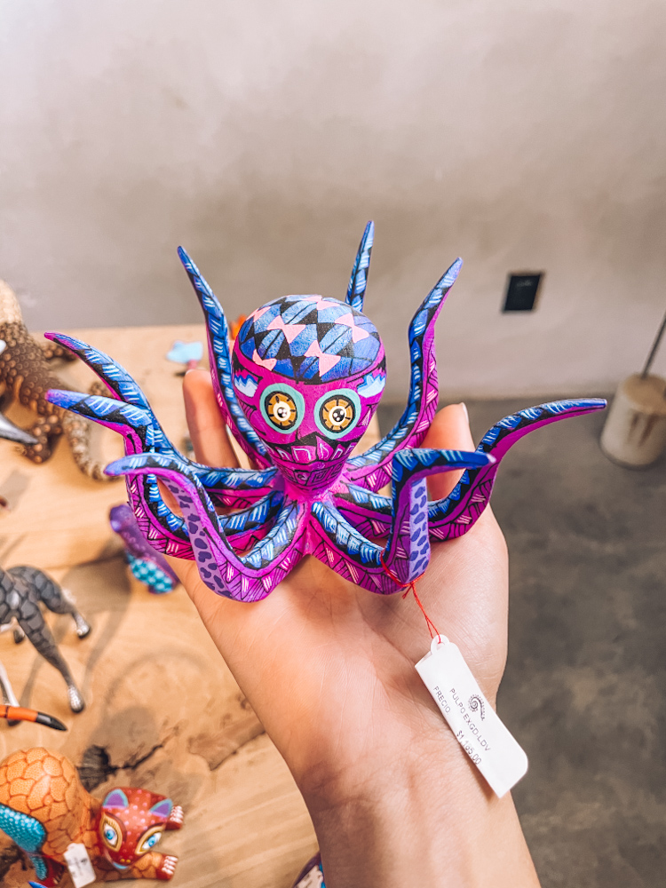 An octopus-shaped blue-and-purple artwork.