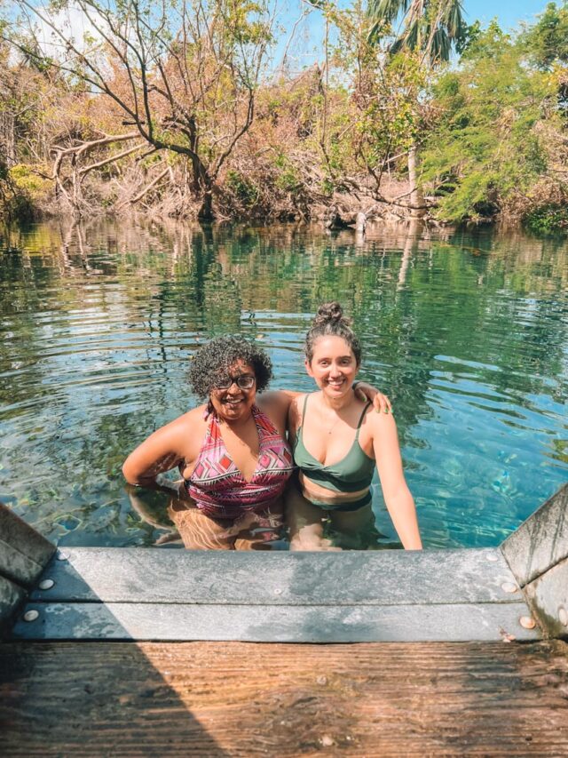 Two women in the waters of Ojos Indigenas Punta Cana