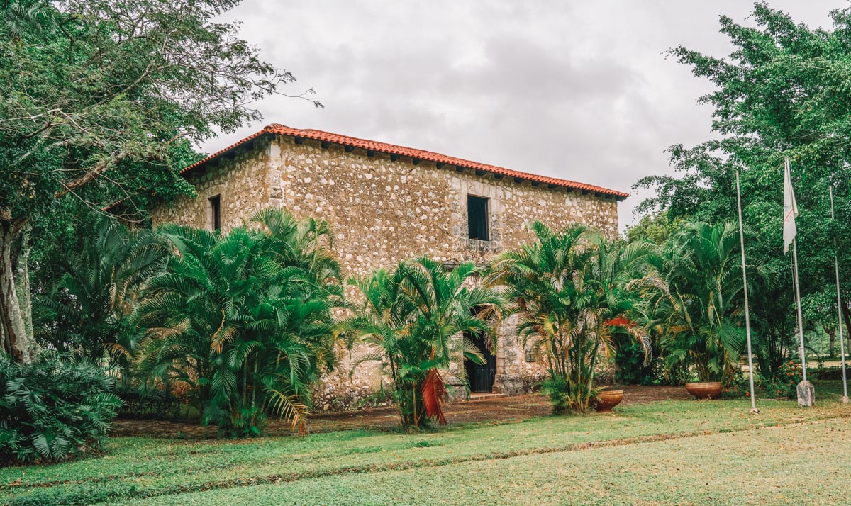 A stone building surrounded by trees in Punta Cana.